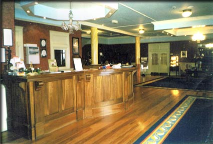 Hotel Reception manufactured by Kelly Bar Off Licence shelving from Kelly Bar Manufacturers, County Mayo, Ireland